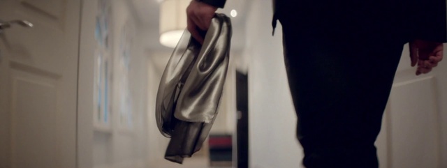 Video Reference: White, Standing, Fashion, Outerwear, Formal wear, Coat, Footwear, Jacket, Suit, Blazer
