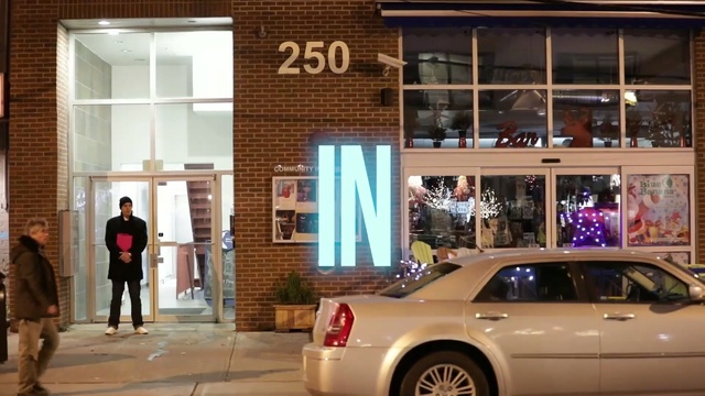 Video Reference: luxury vehicle, family car, car, vehicle, building, mid size car, compact car, Person