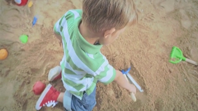 Video Reference: child, play, toddler, climbing hold, soil, sand, grass, recreation, fun
