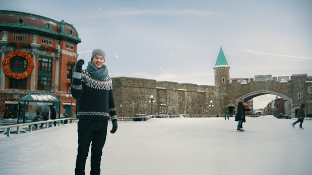 Video Reference: snow, winter, urban area, freezing, ice, city, building, downtown, tourist attraction, sky, Person