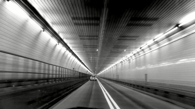 Video Reference: White, Black-and-white, Black, Monochrome photography, Monochrome, Tunnel, Road, Infrastructure, Line, Mode of transport, Person