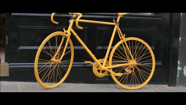 Video Reference: Land vehicle, Bicycle, Bicycle wheel, Vehicle, Bicycle part, Bicycle frame, Bicycle tire, Spoke, Bicycle drivetrain part, Bicycle fork