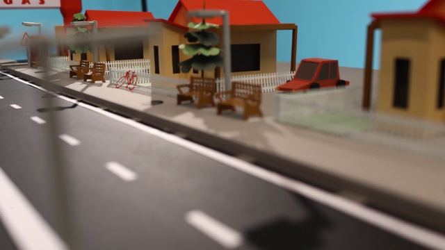 Video Reference: Scale model, Road, Infrastructure, Toy, House, Architecture, Vehicle, Building