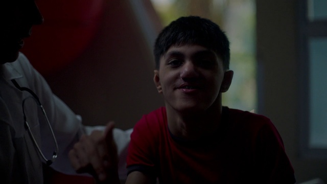Video Reference: Red, Cheek, Fun, Human, Mouth, Photography, Room, Smile, Darkness, Conversation