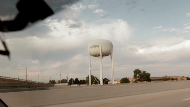 Video Reference: sky, cloud, daytime, road, wind, energy, water tank
