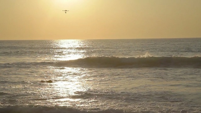 Video Reference: sea, ocean, horizon, wave, shore, wind wave, sky, calm, sunrise, coastal and oceanic landforms