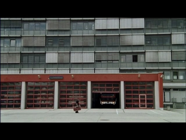 Video Reference: Architecture, Urban area, Facade, Commercial building, Wall, Building, Snapshot, Metropolitan area, Line, Material property