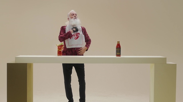 Video Reference: Red, Standing, Table, Furniture, Room, Shelf, Santa claus, Desk