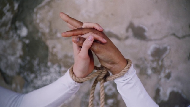 Video Reference: Hand, Finger, Gesture, Thumb, Person, Woman, Young, Cellphone, Holding, Phone, Using, Dress, Wearing, Food, Shirt, Underwear, Man, Girl, White, Standing, Cutting, Playing, Watch, Fashion accessory, Wrist, Nail