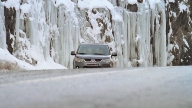 Video Reference: snow, motor vehicle, winter, car, freezing, geological phenomenon, automotive tire, ice, vehicle, automotive exterior, Person