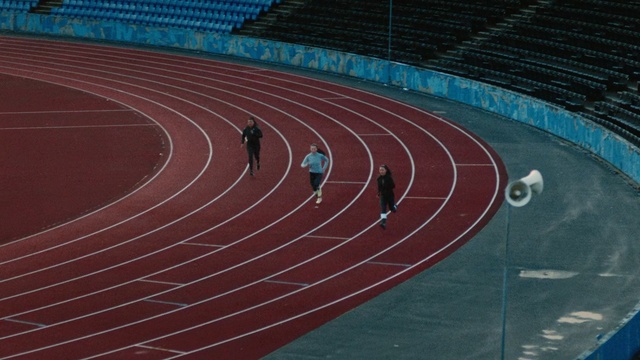 Video Reference: sport venue, structure, athletics, track and field athletics, stadium, line, atmosphere, arena, race track, sports, Person