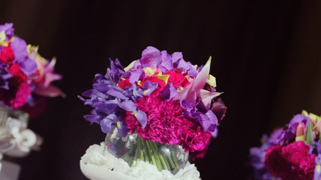 Video Reference: flower, pink, purple, flower arranging, floristry, flowering plant, plant, violet, flower bouquet, cut flowers, Person