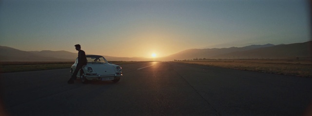 Video Reference: Sky, Vehicle, Mode of transport, Natural environment, Car, Landscape, Ecoregion, Desert, Road, Road trip