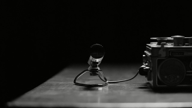 Video Reference: black, black and white, photography, still life photography, monochrome, monochrome photography, audio equipment, microphone, darkness, audio