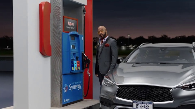 Video Reference: Land vehicle, Vehicle, Automotive design, Car, Luxury vehicle, Mid-size car, Grille, Concept car, Performance car, Sedan, Person, Outdoor, Sitting, Parked, Front, Man, Standing, Table, White, Red, Black, Parking, Street, Young, Meter, Refrigerator, Text, Suit, Wheel, Clothing
