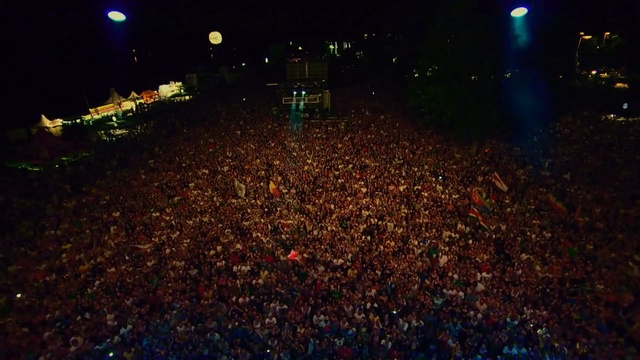 Video Reference: crowd, entertainment, festival, night, stage, audience, rock concert, event, concert, atmosphere