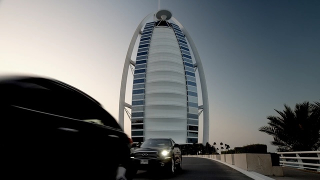 Video Reference: Architecture, Building, Tower block, Metropolitan area, Vehicle, Luxury vehicle, Condominium, Skyscraper, Car, Commercial building
