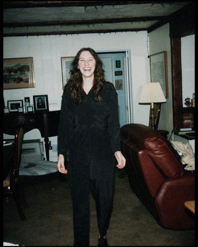 Video Reference: standing, dress, shoulder, outerwear, fashion, girl, fur, suit, formal wear, fun, Person