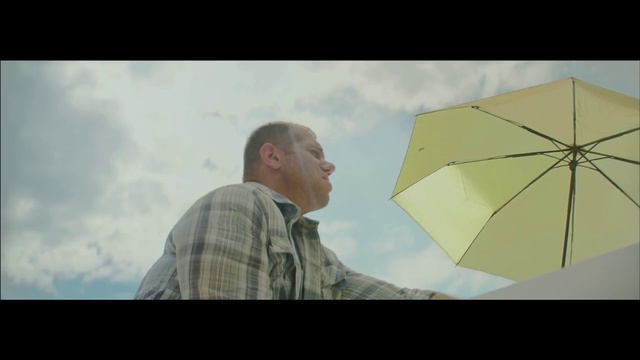 Video Reference: Umbrella, Photograph, Head, Yellow, Sky, Human, Fashion accessory, Photography, Stock photography, Sitting