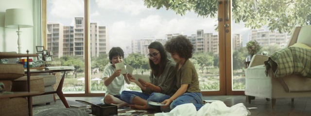 Video Reference: Sitting, Fun, Leisure, Adaptation, Reading, Room, Child, Electronic device, Sharing, Conversation