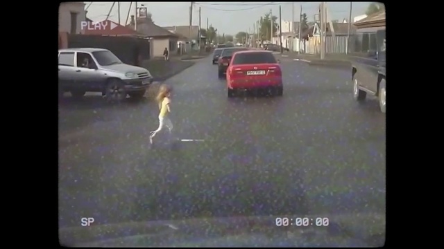 Video Reference: Car, Land vehicle, Vehicle, Automotive tail & brake light, Motor vehicle, Automotive lighting, Tire, Automotive mirror, Asphalt, Automotive exterior