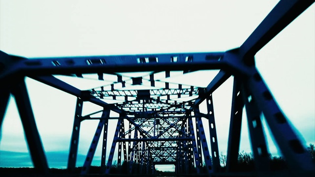 Video Reference: Blue, Sky, Bridge, Iron, Water, Girder bridge, Nonbuilding structure, Metal, Trestle, Truss bridge