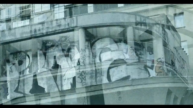 Video Reference: landmark, photograph, black and white, building, urban area, monochrome photography, mode of transport, structure, architecture, glass