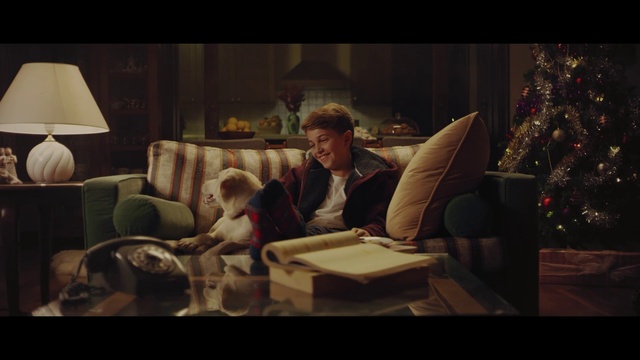 Video Reference: Photograph, Living room, Room, Snapshot, Screenshot, Human, Couch, Sitting, Conversation, Photography