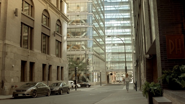 Video Reference: building, infrastructure, metropolitan area, urban area, neighbourhood, city, town, architecture, alley, downtown, Person