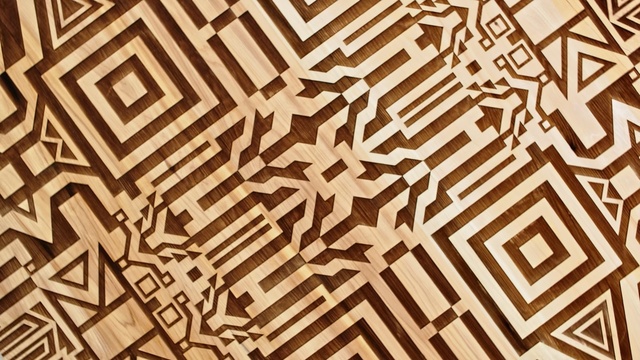 Video Reference: pattern, design, line, wood, symmetry, font, Person