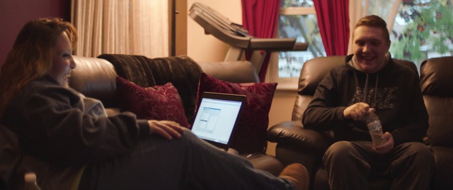 Video Reference: Comfort, Room, Furniture, Conversation, Technology, Electronic device, Sitting, Living room, Interior design, Couch