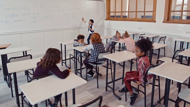 Video Reference: Classroom, Room, Class, Education, Table, Furniture, Event, Adaptation, Learning, Building