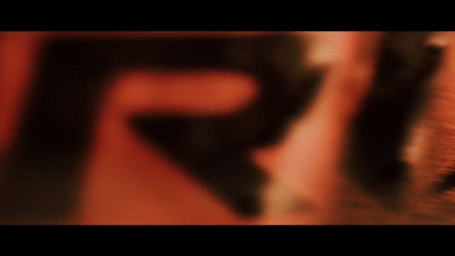 Video Reference: red, face, black, skin, nose, text, darkness, close up, light, photography