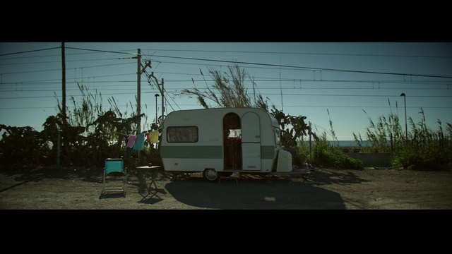 Video Reference: sky, tree, car, plant, house, darkness, cloud, evening, vehicle, landscape, Person