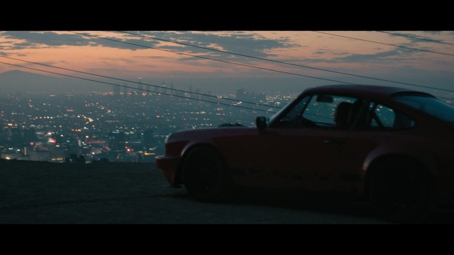 Video Reference: Land vehicle, Vehicle, Car, Regularity rally, Automotive design, Reflection, Sky, Coupé, Sports car, Sedan