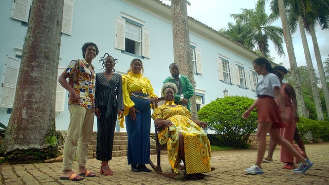 Video Reference: Plant, Window, Sky, Temple, Drum, Tire, Building, Tree, Neighbourhood, Musical instrument