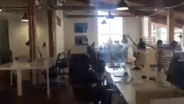 Video Reference: Property, Room, Office, Building, Interior design, Machine, Ceiling, Table, Flooring, Glass