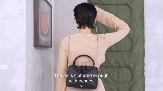Video Reference: Shoulder, Neck, Arm, Joint, Waist, Bag, Outerwear, Human body, Black hair, Fashion accessory