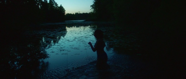 Video Reference: Water, Blue, Sky, River, Reflection, Darkness, Evening, Photography, Fly fishing, Recreational fishing, Outdoor, Dark, Lake, Man, Body, Standing, Boat, Large, Sunset, Pond, Dock, Light, Sun, Floating, Holding, Swimming, Sport, Nature, Distance