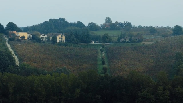 Video Reference: Atmospheric phenomenon, Hill station, Natural landscape, Hill, Highland, Sky, Rural area, Tree, Land lot, Landscape, Person