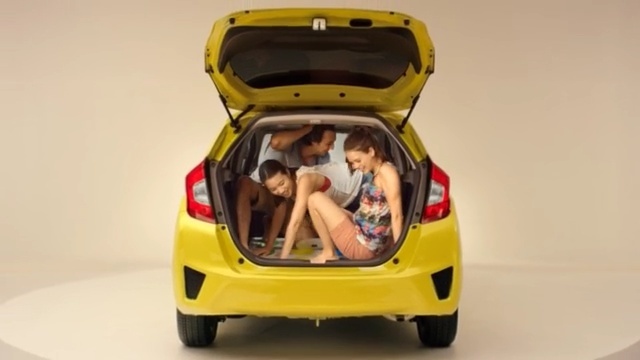 Video Reference: car, motor vehicle, vehicle, yellow, automotive design, mode of transport, auto show, vehicle door, city car, automotive exterior