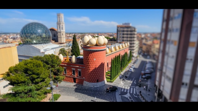 Video Reference: landmark, urban area, city, architecture, sky, roof, building, tree, outdoor structure, real estate