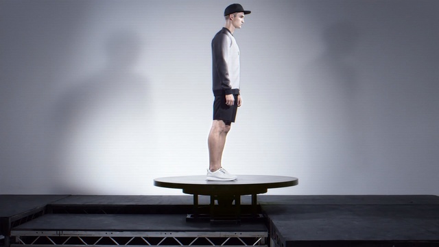 Video Reference: standing, table, furniture, Person