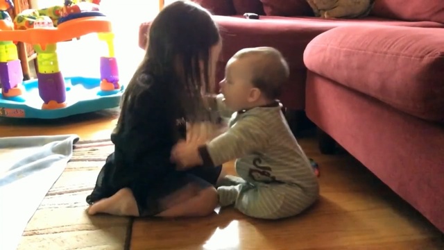 Video Reference: child, room, sitting, play, girl, toddler, interaction, fun, flooring, daughter