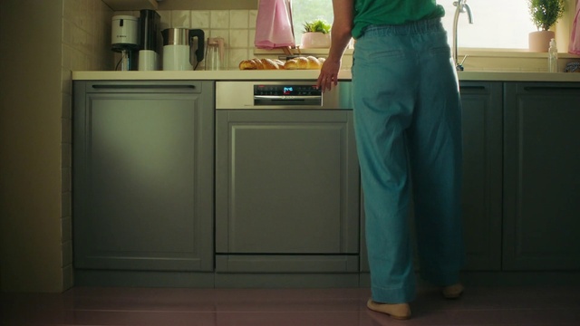 Video Reference: Major appliance, Green, Floor, Room, Standing, Home appliance, Flooring, Kitchen appliance, Dishwasher, Kitchen