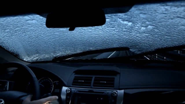 Video Reference: car, motor vehicle, vehicle, automotive design, glass, steering wheel, windshield, personal luxury car, driving, center console