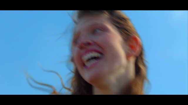 Video Reference: Face, Hair, Facial expression, Nose, Smile, Head, Blond, Chin, Skin, Beauty