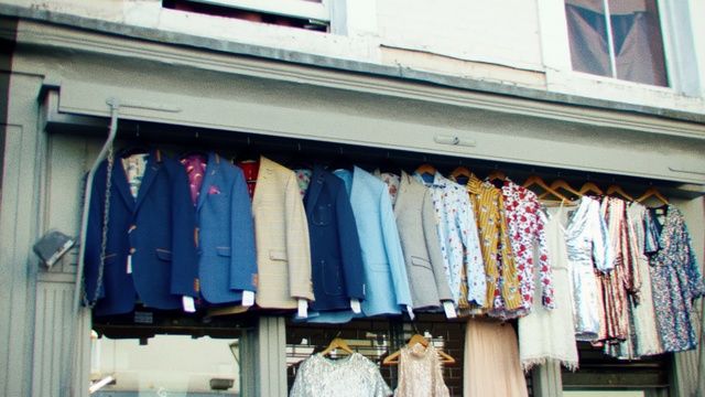 Video Reference: Boutique, Closet, Room, Clothes hanger, Outlet store, Textile, Dry cleaning, Wardrobe, T-shirt, Building