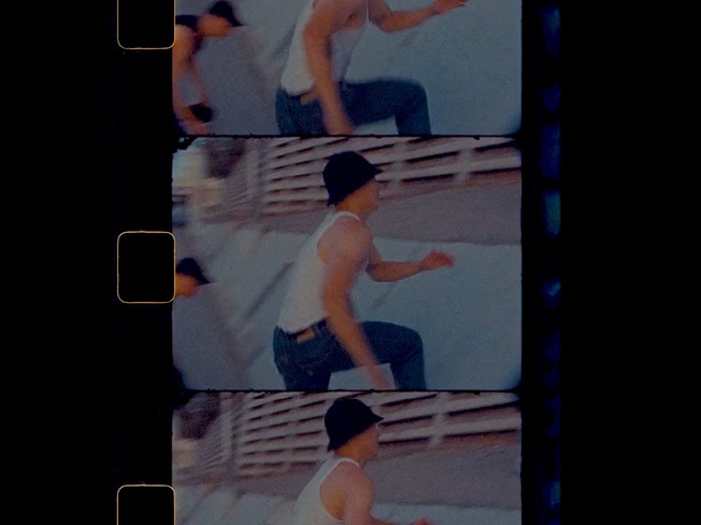 Video Reference: Barechested, Male, Arm, Leg, Muscle, Back, Room, Art, Photography, Games, Person, Man, Young, Front, Boy, Shirt, Holding, Television, Monitor, Standing, Striped, Woman, Bed, Girl, Screen, Computer, Board, Playing, White, Clothing, Text