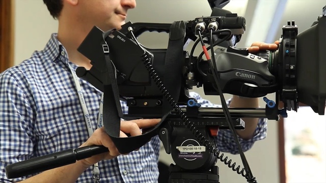 Video Reference: camera accessory, cameras & optics, filmmaking, camera operator, cinematographer, shoulder, product, videographer, camera, single lens reflex camera, Person